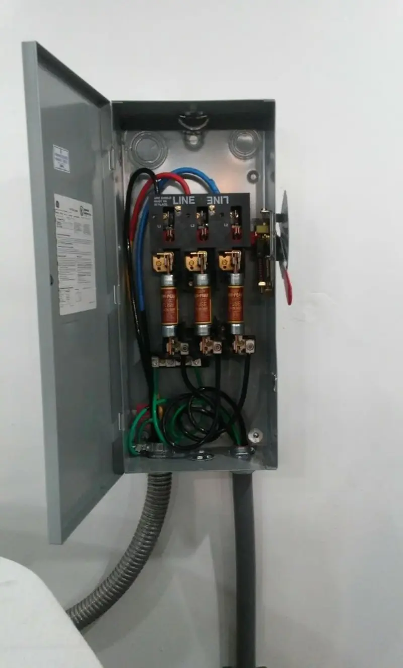 Three-phase disconnect switch installed for Smoke Detector Installation in Daytona Beach